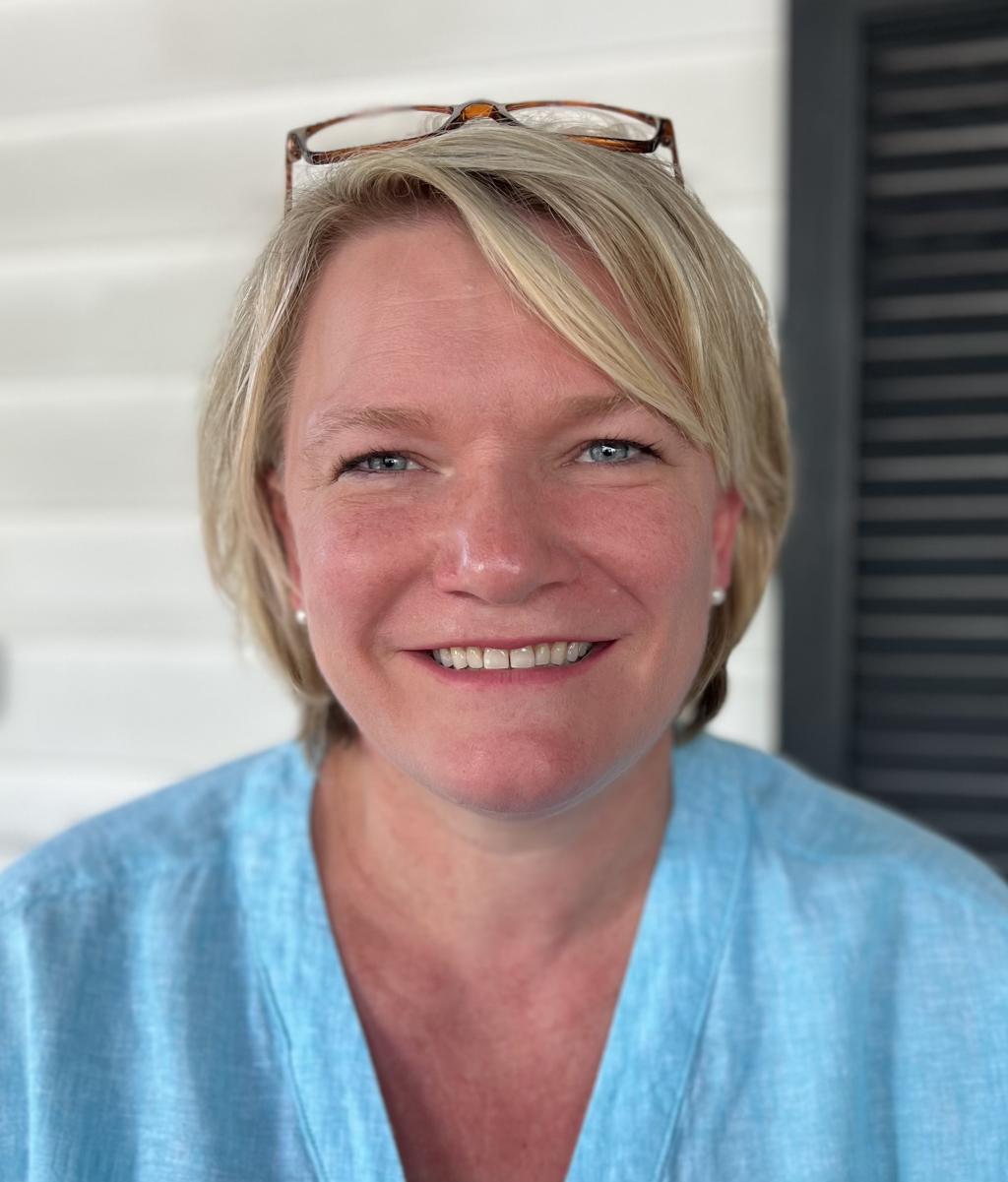 Viney Vidal, 1:1 Nurse at Bridge Street School smiles at the camera